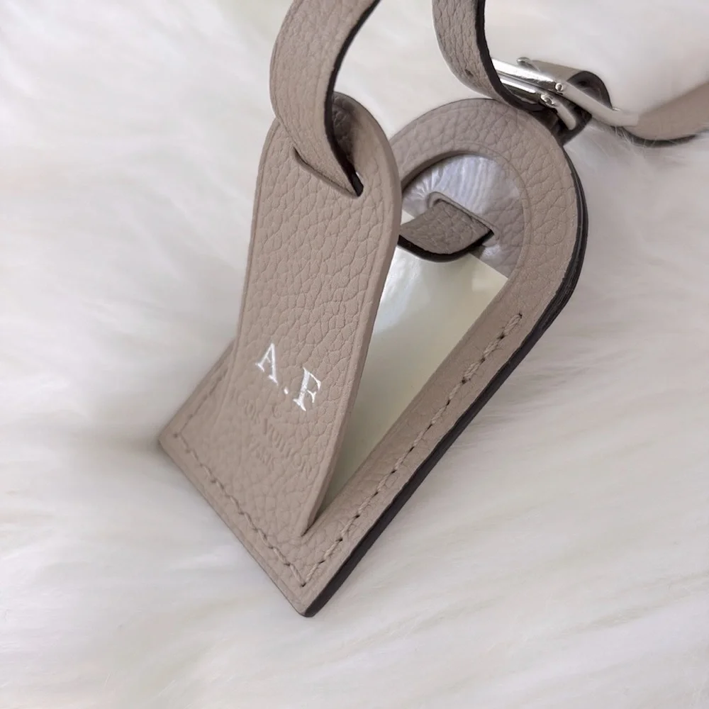 Louis Vuitton Taiga Leather Luggage Tag‎